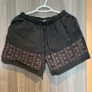 Surfers Paradise black shorts with floral prints (Large)